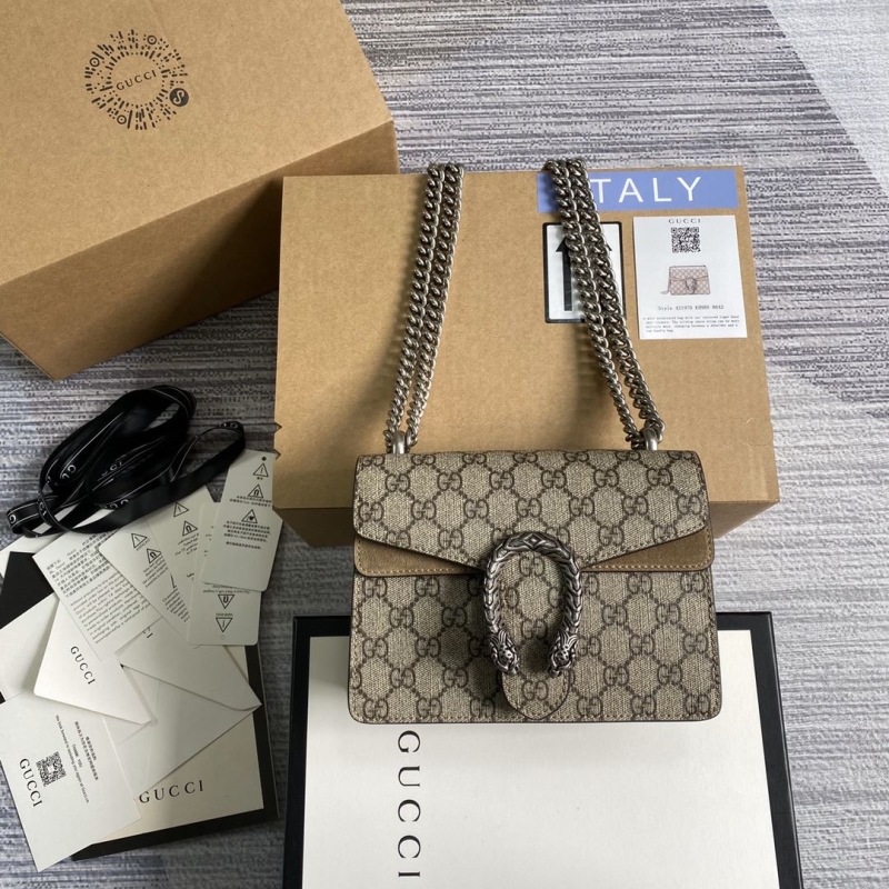 G*u*i top handle bags